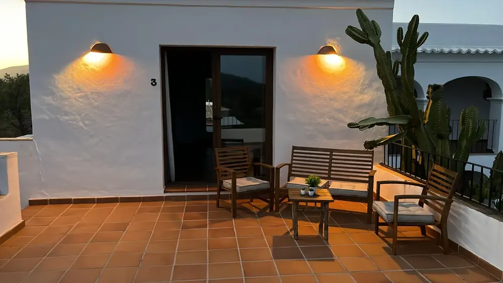 Rooftop studio at golden hour — private terrace with valley views in Ibiza